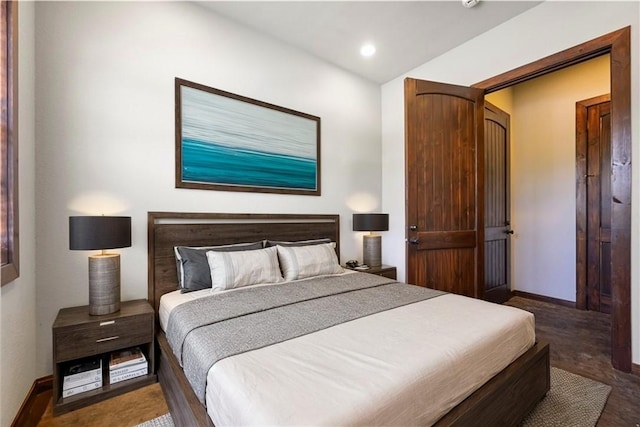 bedroom featuring baseboards and recessed lighting