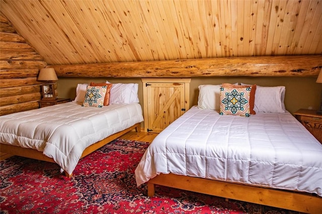 bedroom with hardwood / wood-style flooring, wooden ceiling, and rustic walls