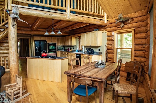 kitchen with rustic walls, wooden ceiling, light brown cabinets, light hardwood / wood-style floors, and black appliances