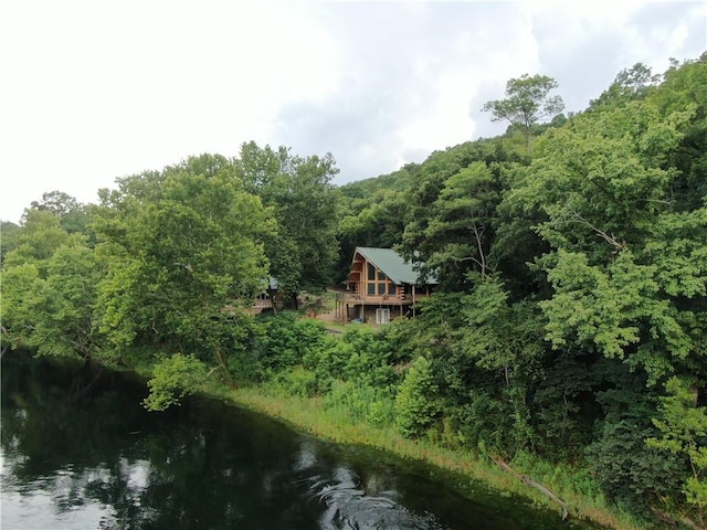 drone / aerial view featuring a water view