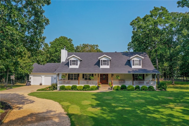 cape cod-style house with a front lawn, a garage, and covered porch