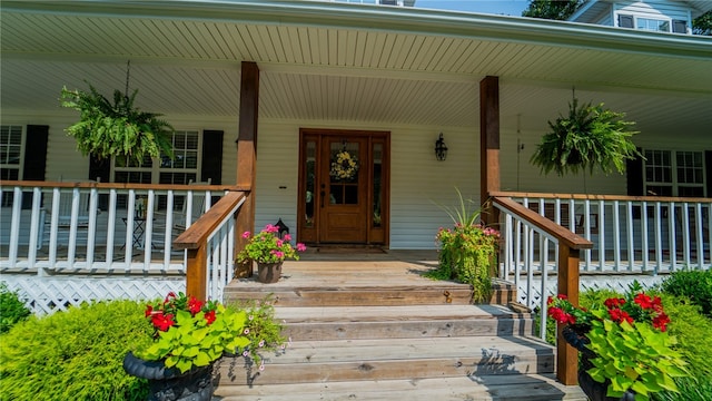 property entrance with covered porch