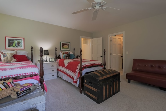 bedroom with light colored carpet and ceiling fan