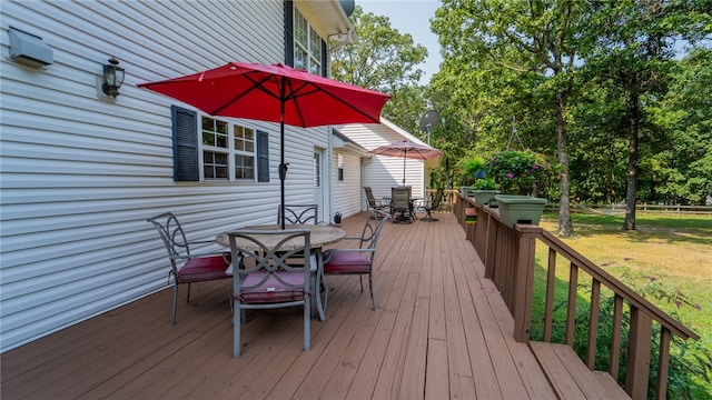 deck featuring a lawn