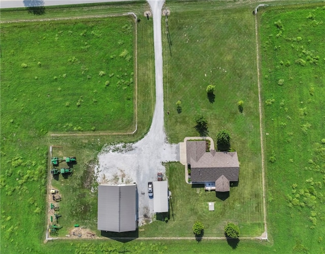 birds eye view of property featuring a rural view