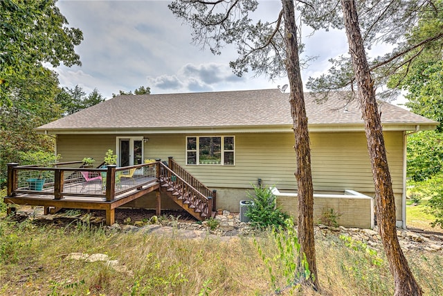 rear view of property with a deck