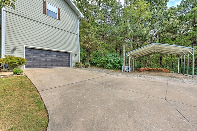 view of side of property featuring a garage and a carport