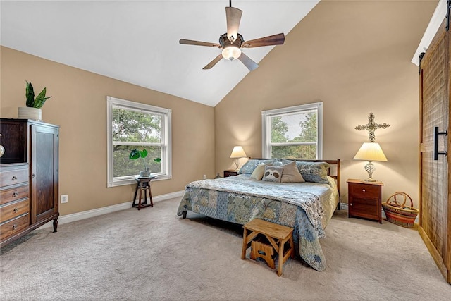 carpeted bedroom with ceiling fan, high vaulted ceiling, and multiple windows