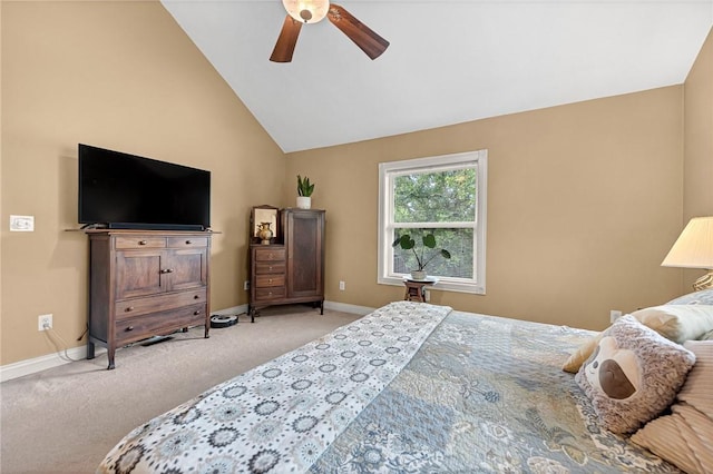 bedroom featuring ceiling fan, vaulted ceiling, and light carpet