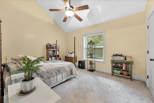 bedroom featuring carpet floors, vaulted ceiling, and ceiling fan