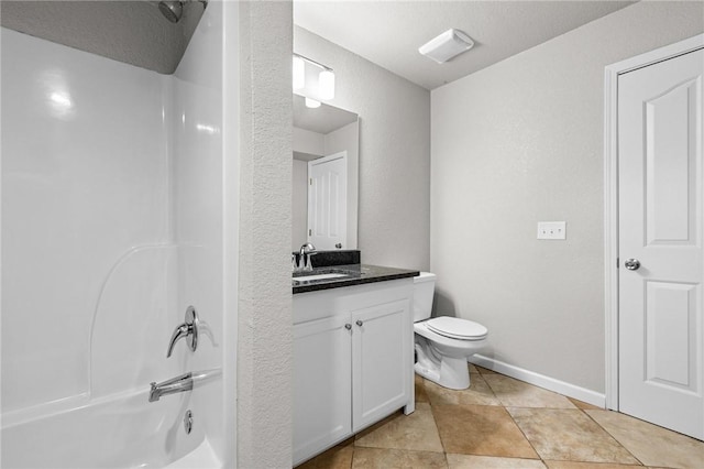 full bathroom featuring toilet, vanity, bathtub / shower combination, and a textured ceiling