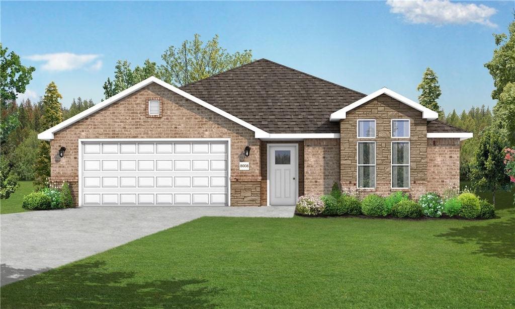 view of front facade with a garage and a front yard