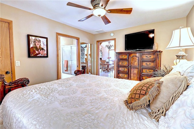 bedroom featuring a ceiling fan and visible vents