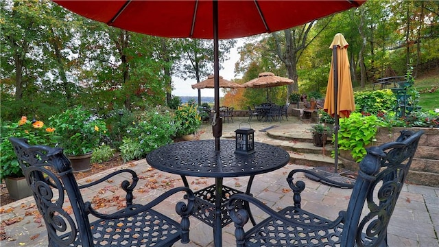 view of patio with outdoor dining area