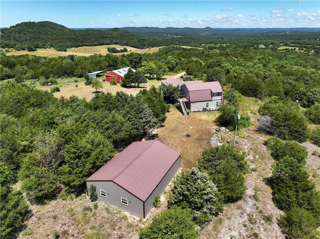 bird's eye view with a view of trees