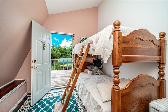 bedroom with vaulted ceiling