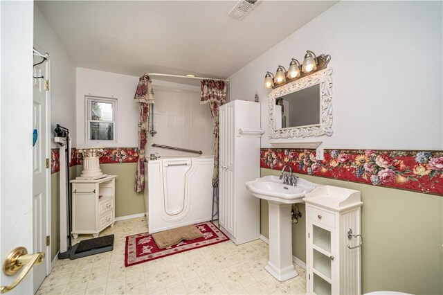 bathroom featuring tile patterned flooring