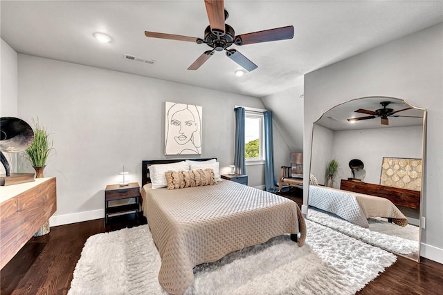 bedroom with baseboards, wood finished floors, a ceiling fan, and vaulted ceiling