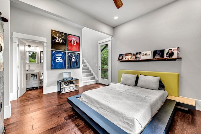 bedroom featuring ceiling fan, access to exterior, and dark wood-type flooring