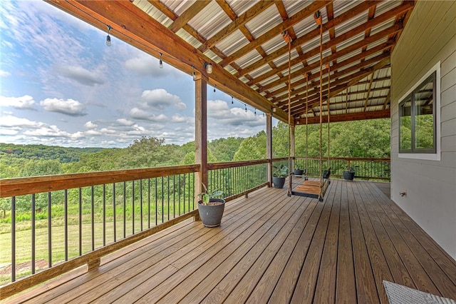 deck featuring a wooded view