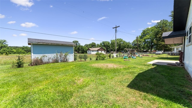 view of yard with a playground