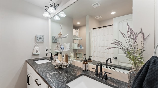 bathroom featuring double sink vanity