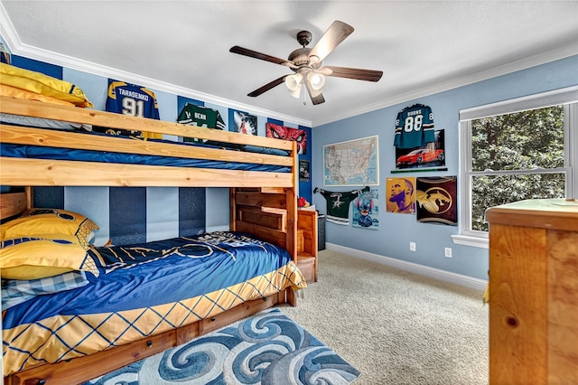 bedroom featuring crown molding, carpet, and ceiling fan