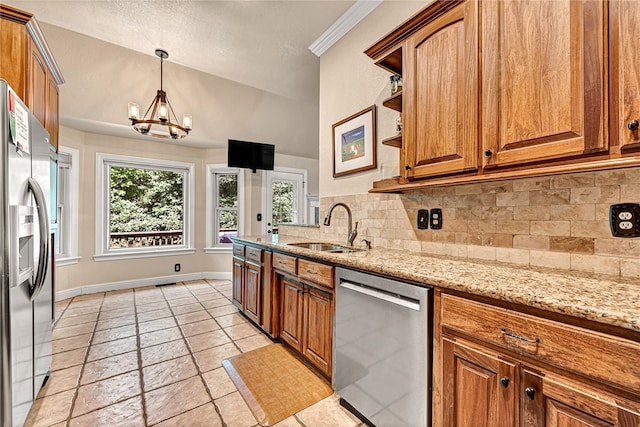 kitchen featuring light tile patterned flooring, light stone countertops, appliances with stainless steel finishes, decorative backsplash, and sink