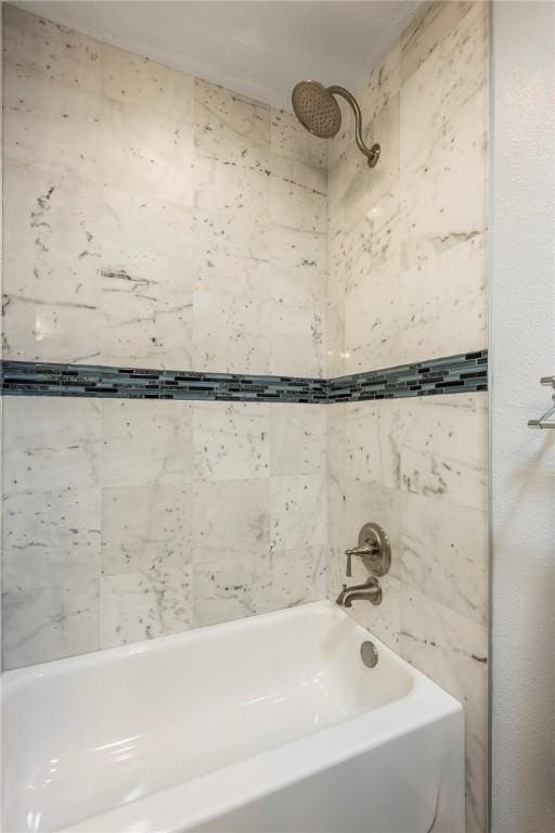 bathroom with shower / tub combination