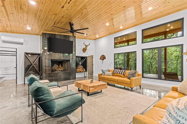 living room featuring a wall mounted air conditioner, wooden ceiling, a tile fireplace, and a high ceiling