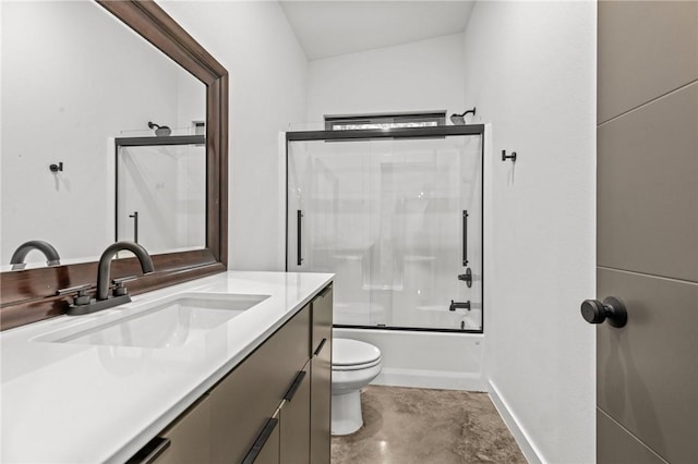 full bathroom featuring vanity, concrete flooring, toilet, and combined bath / shower with glass door