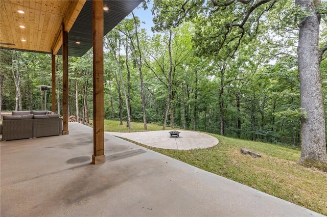 view of patio with a fire pit