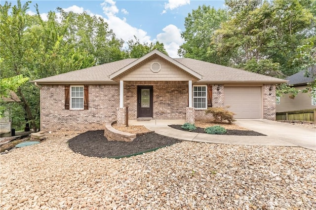 ranch-style house featuring a garage