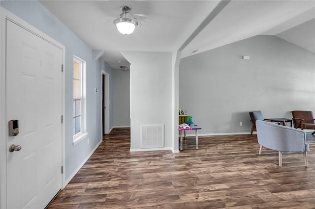 office featuring dark hardwood / wood-style flooring and vaulted ceiling