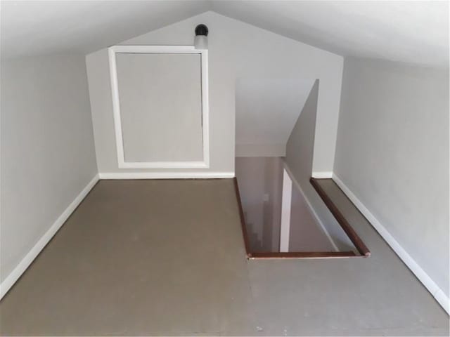 bonus room with vaulted ceiling