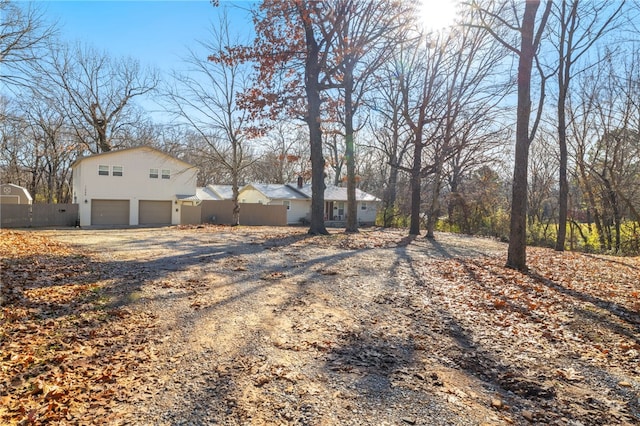 view of yard with a garage