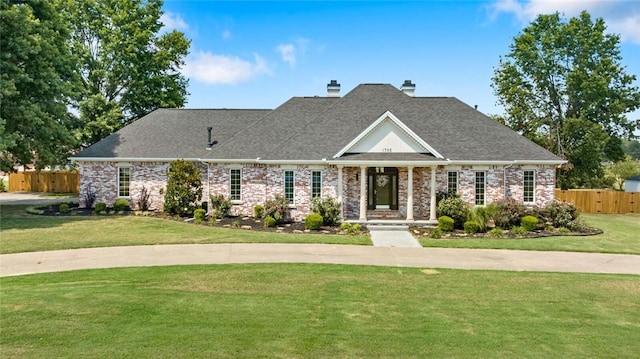 view of front of home with a front lawn