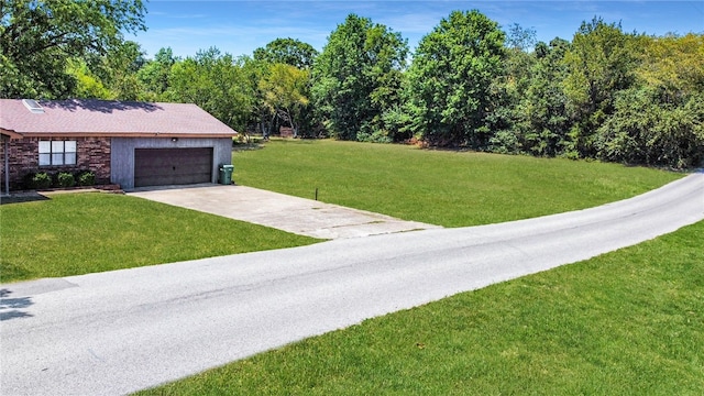 view of yard featuring a garage