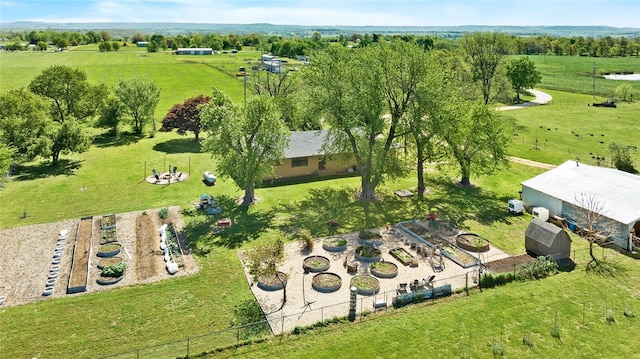 birds eye view of property featuring a rural view