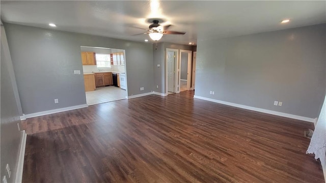 3810 Rainbow Farm Rd, Bentonville, AR 72713 - unfurnished living room featuring dark hardwood / wood-style floors and ceiling fan