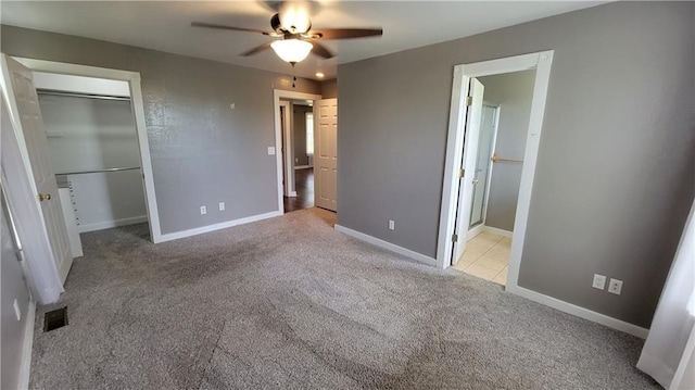 3810 Rainbow Farm Rd, Bentonville, AR 72713 - unfurnished bedroom featuring ceiling fan, a closet, ensuite bath, and light carpet