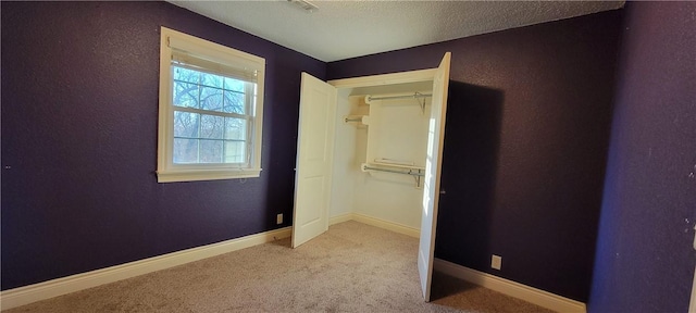 3810 Rainbow Farm Rd, Bentonville, AR 72713 - unfurnished bedroom featuring light colored carpet and a textured ceiling