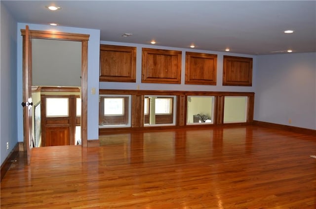 unfurnished living room featuring light hardwood / wood-style floors