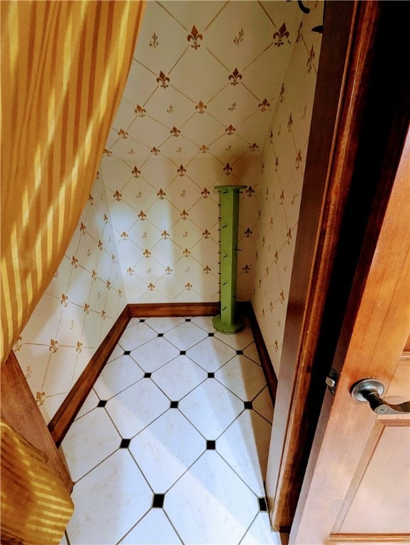 additional living space with tile patterned flooring