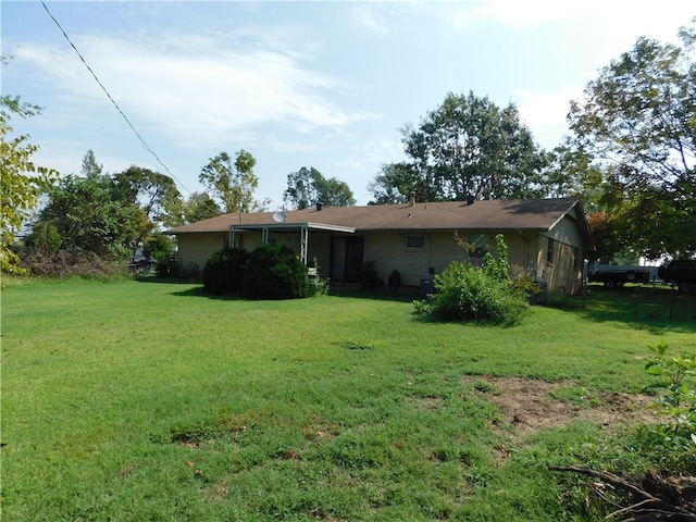 exterior space with a lawn