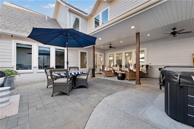 view of patio / terrace featuring ceiling fan and an outdoor living space