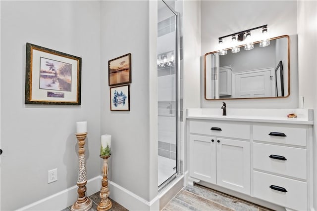 bathroom with vanity and an enclosed shower