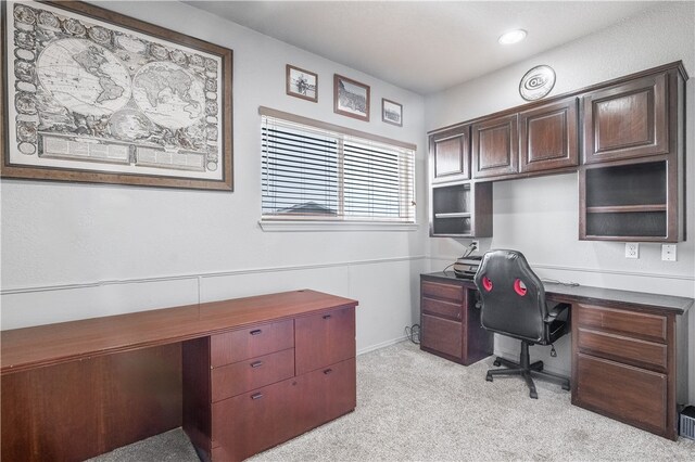 office area featuring light colored carpet