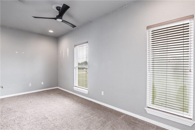 unfurnished room featuring recessed lighting, baseboards, carpet, and a ceiling fan