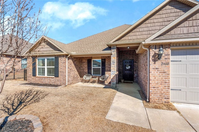 view of front of property with a garage